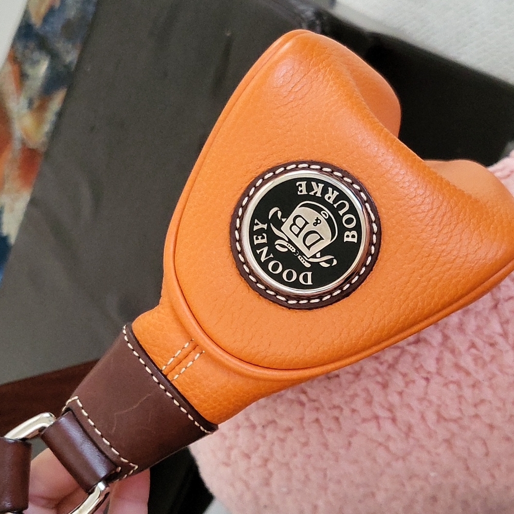 Dooney & Bourke Wayfarer orange and brown Pebbled Leather Hobo